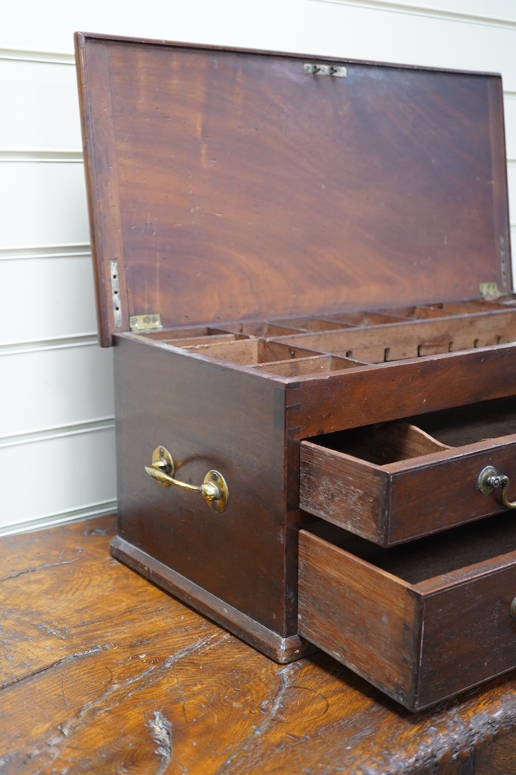 A mahogany table top three drawer stationery chest, 62cm wide, 25cm high, 29cm deep. Condition - fair